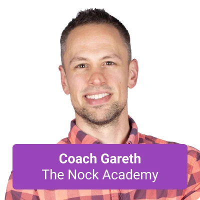 Image of Coach Gareth smiling in a flannel shirt